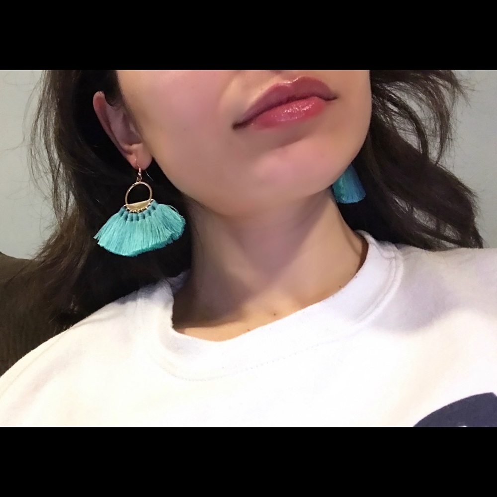Teal fan/fringe earrings.